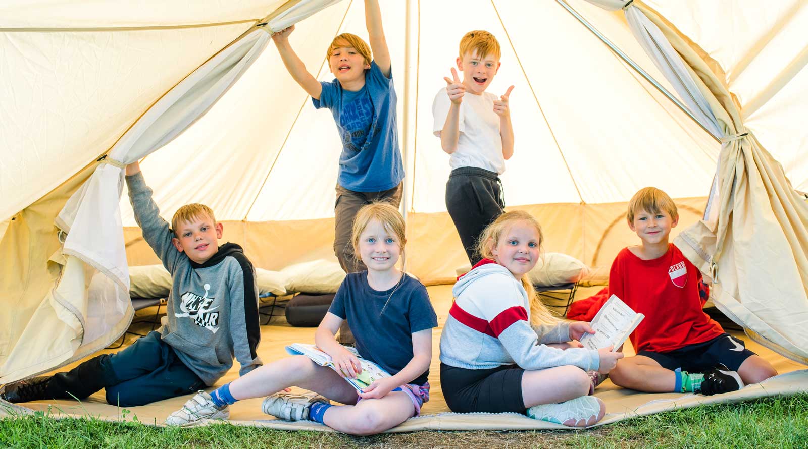 children in a tent at hooke court dorset